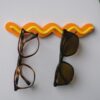 il_fullxfull.8220161782_i2oj.jpg Ripple Rack Sunglasses Organizer | Wall Mounted Eyewear Display